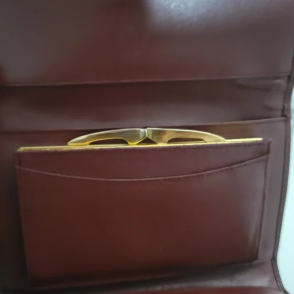 Cartier signature wallet with inside kiss lock and zipper pocket. EUC - Picture 11 of 13